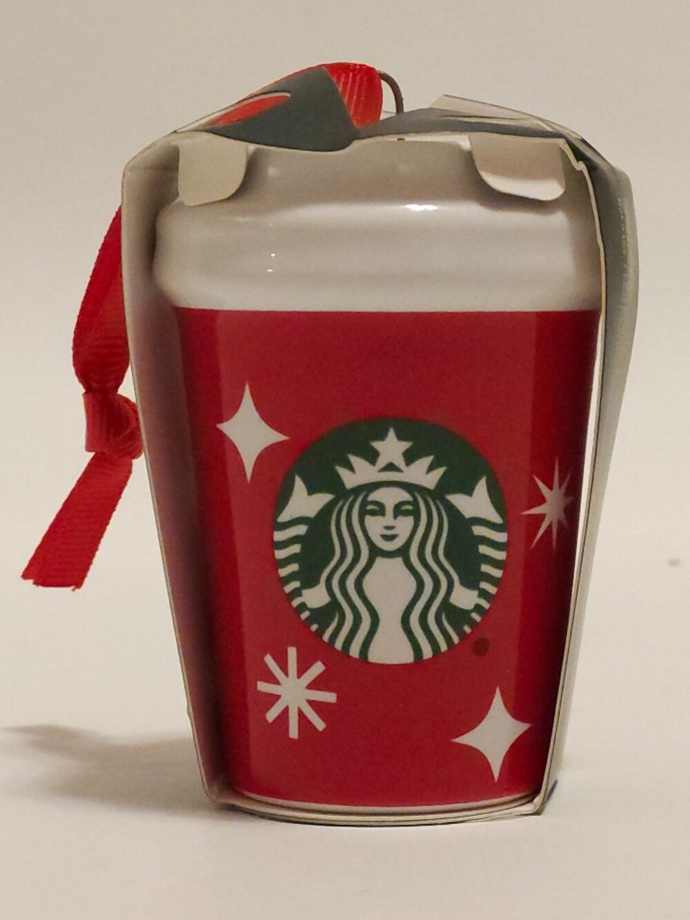 NEW Starbucks 2022 red ceramic cup to go ornament with white snowflakes